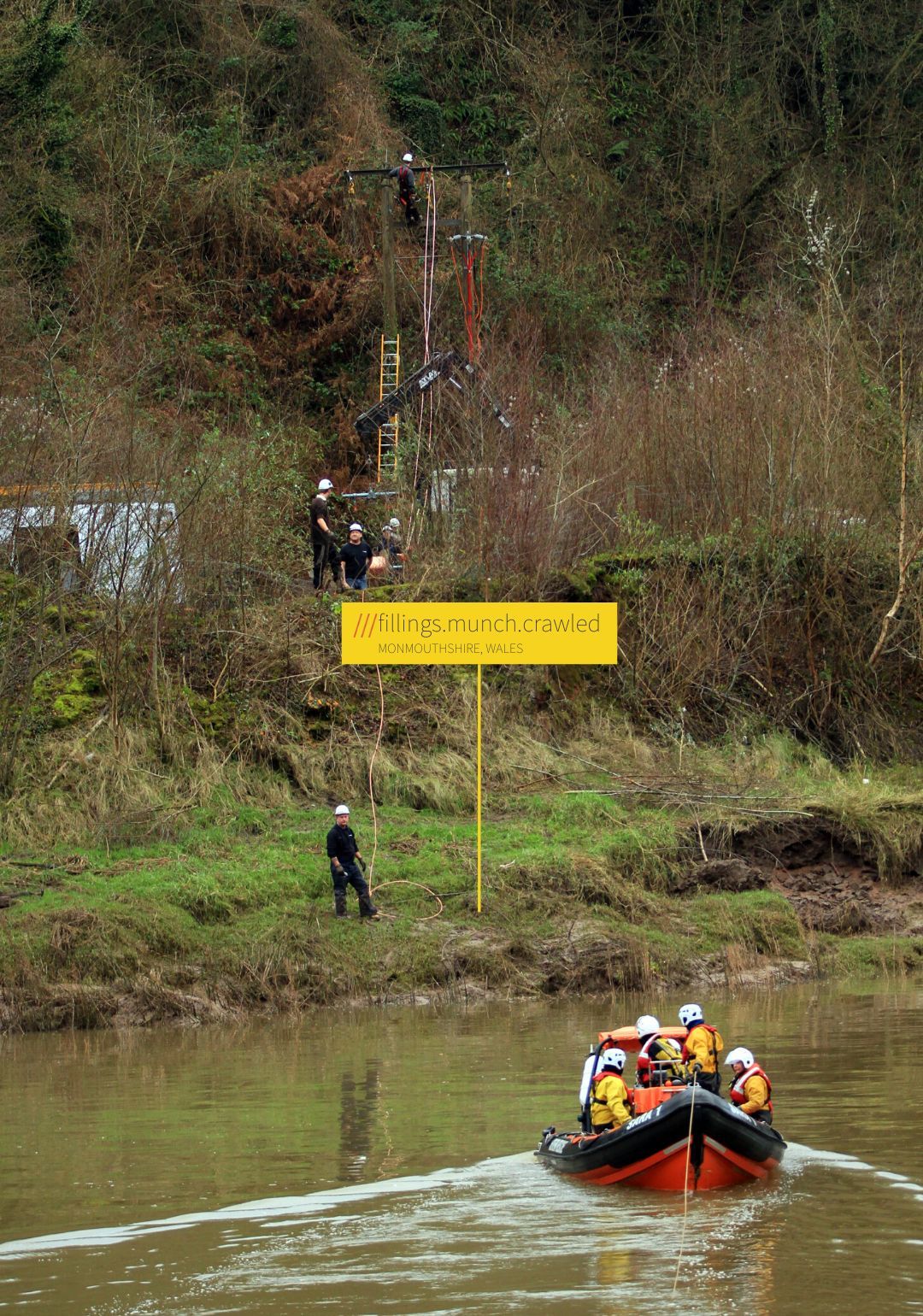 WPD engineers in a boat with what3words code