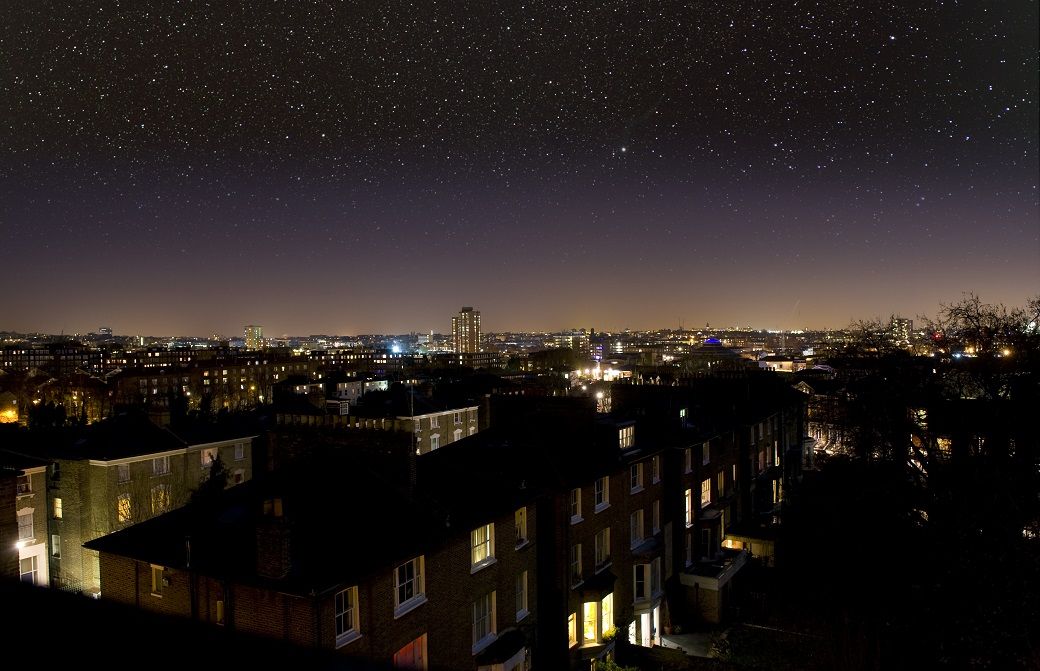 A city with lights on at night