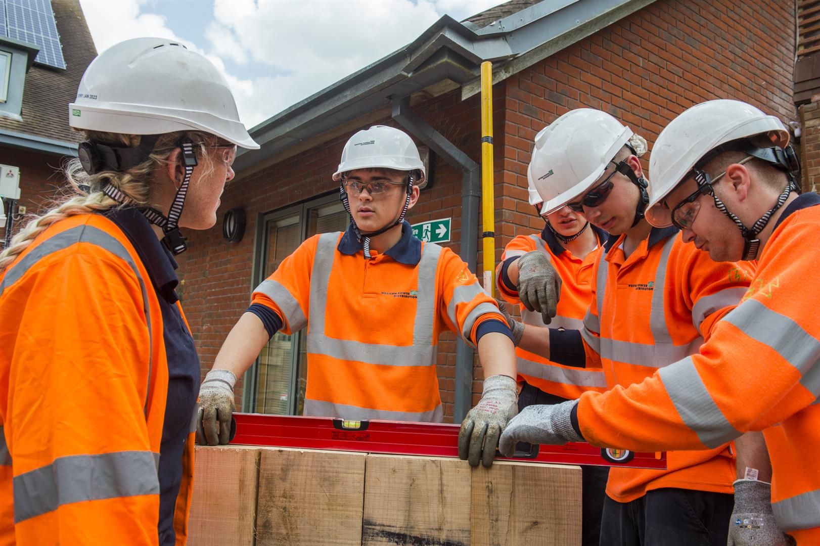 A group of WPD apprentices discussing