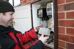 Meter being fitted outside house