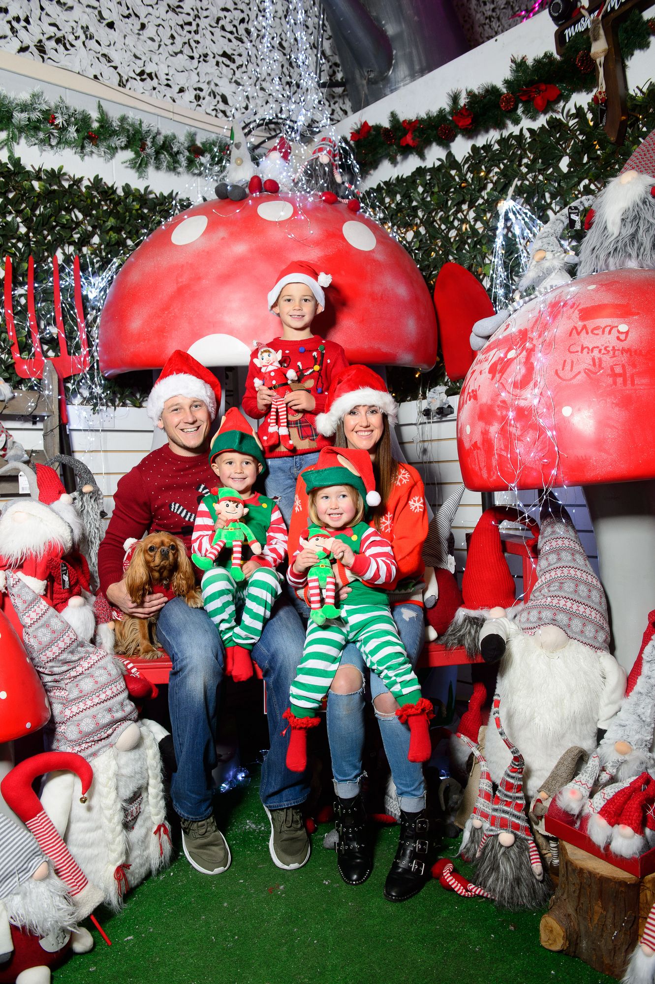 Family dressed up in Christmas outfits